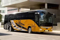 Printzone Advertising LLC vehicle branding company in Dubai Al Quoz wrapping a commercial bus with full vinyl wrap