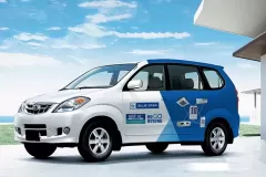 Printzone Advertising LLC vehicle branding company in Dubai Al Quoz wrapping a commercial car with full vinyl wrap