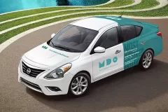Printzone Advertising LLC vehicle branding company in Dubai Al Quoz wrapping a commercial car with full vinyl wrap