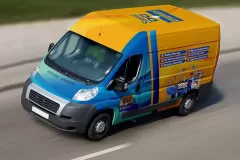 Printzone Advertising LLC vehicle branding company in Dubai Al Quoz wrapping a commercial van with full vinyl wrap