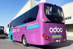 Printzone Advertising LLC vehicle branding company in Dubai Al Quoz wrapping a commercial bus with full vinyl wrap