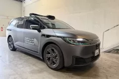 Printzone Advertising LLC vehicle branding company in Dubai Al Quoz wrapping a commercial car with full vinyl wrap
