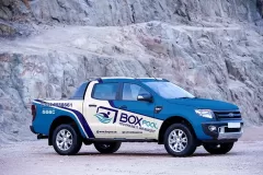 Printzone Advertising LLC vehicle branding company in Dubai Al Quoz wrapping a commercial vehicle with full vinyl wrap