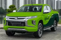 Printzone Advertising LLC vehicle branding company in Dubai Al Quoz wrapping a commercial vehicle with full vinyl wrap
