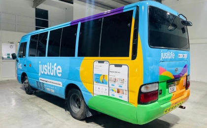 Vehicle branding bus wrap in Dubai with large format advertising graphics for brand awareness by Printzone Advertising in Dubai