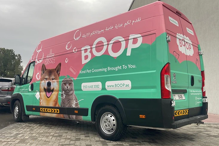 Dubai Vehicle Branding Permit Guide 2026 Printzone Advertising LLC - Vehicle branding company in Dubai wrapping a commercial Bus car van with full vinyl wrap - 11