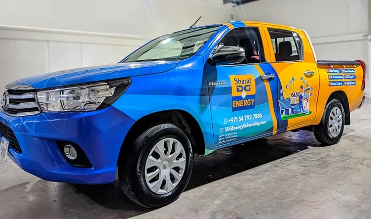 What Are the Key Elements of High-Impact Vehicle Graphics Printzone Advertising LLC - Vehicle branding company in Dubai wrapping a commercial Bus car van with full vinyl wrap - 6