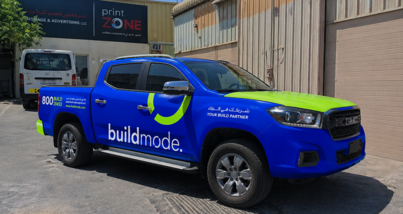 Vehicle branding company in Dubai wrapping a commercial van with full vinyl wrap-102