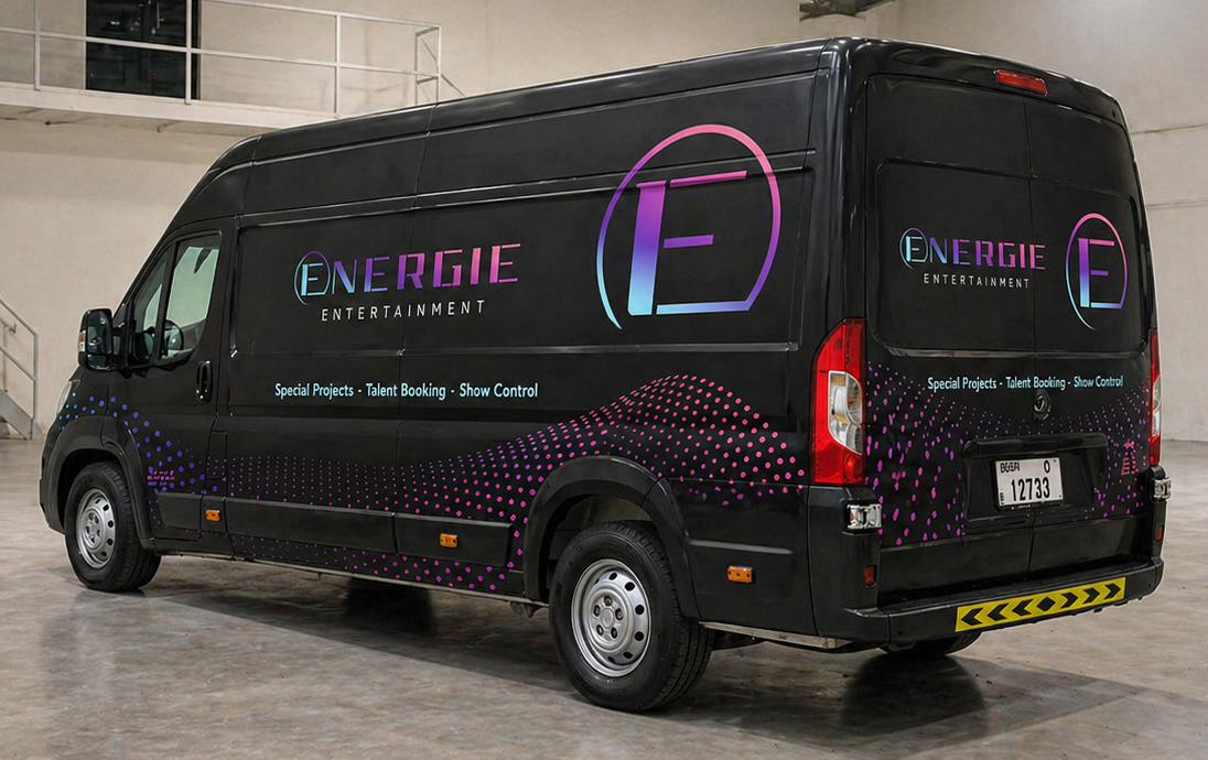 Vehicle branding company in Dubai wrapping a commercial van with full vinyl wrap-97