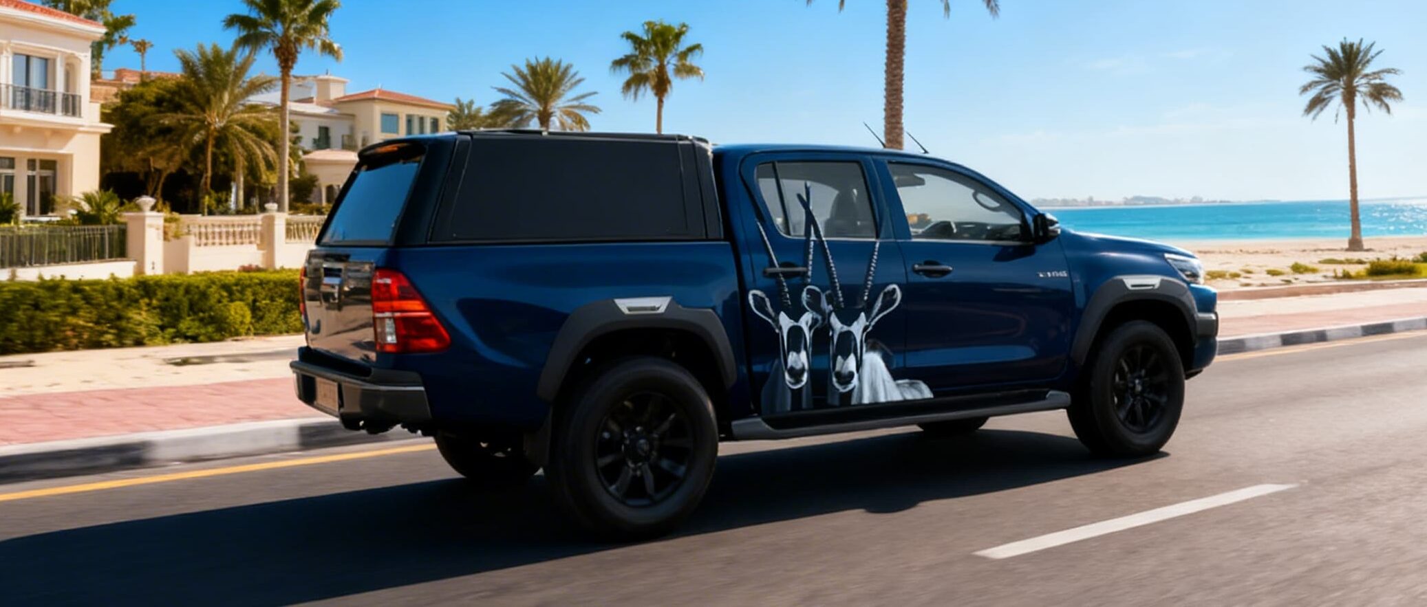 Vehicle branding company in Dubai wrapping a commercial Truck and vehicle with full vinyl wrap - 1