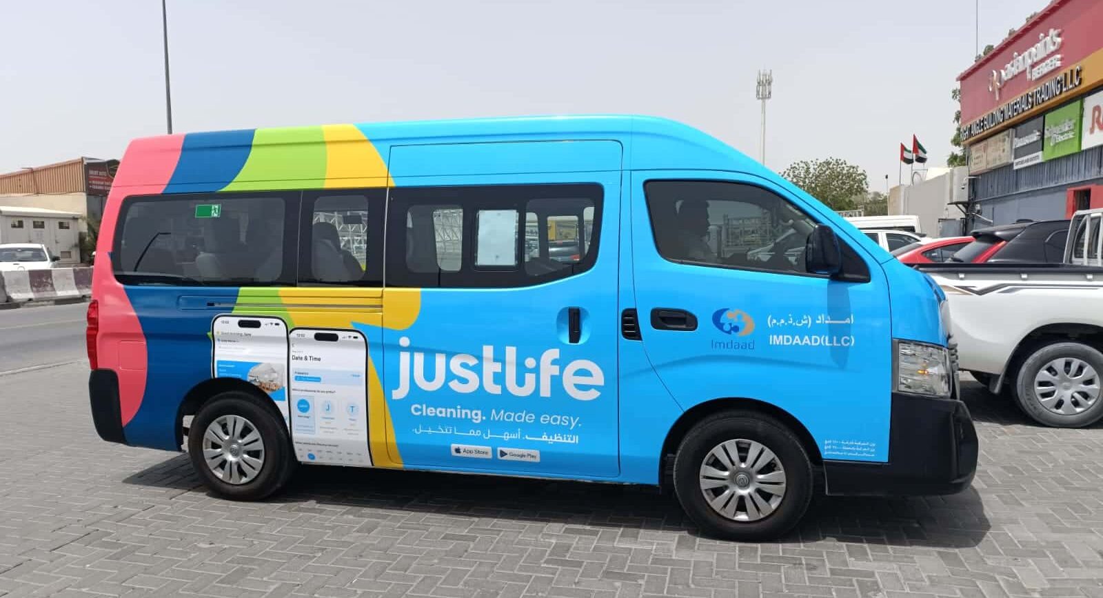 Vehicle branding company in Dubai wrapping a commercial van with full vinyl wrap-98