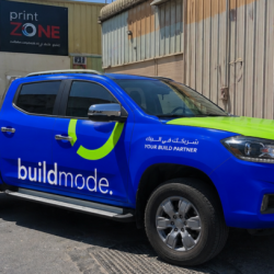 Vehicle branding company in Dubai wrapping a commercial van with full vinyl wrap-102